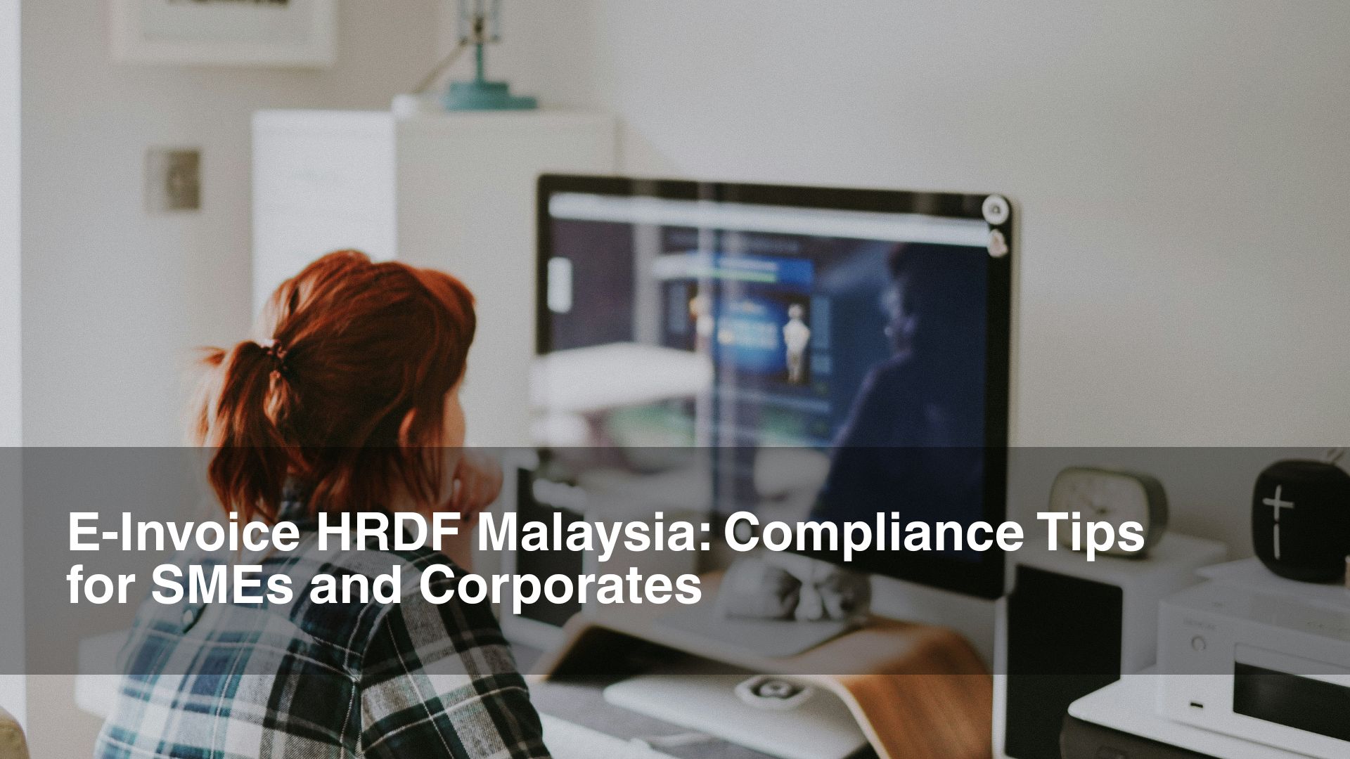 woman stares at mac screen very closely for her einvoice