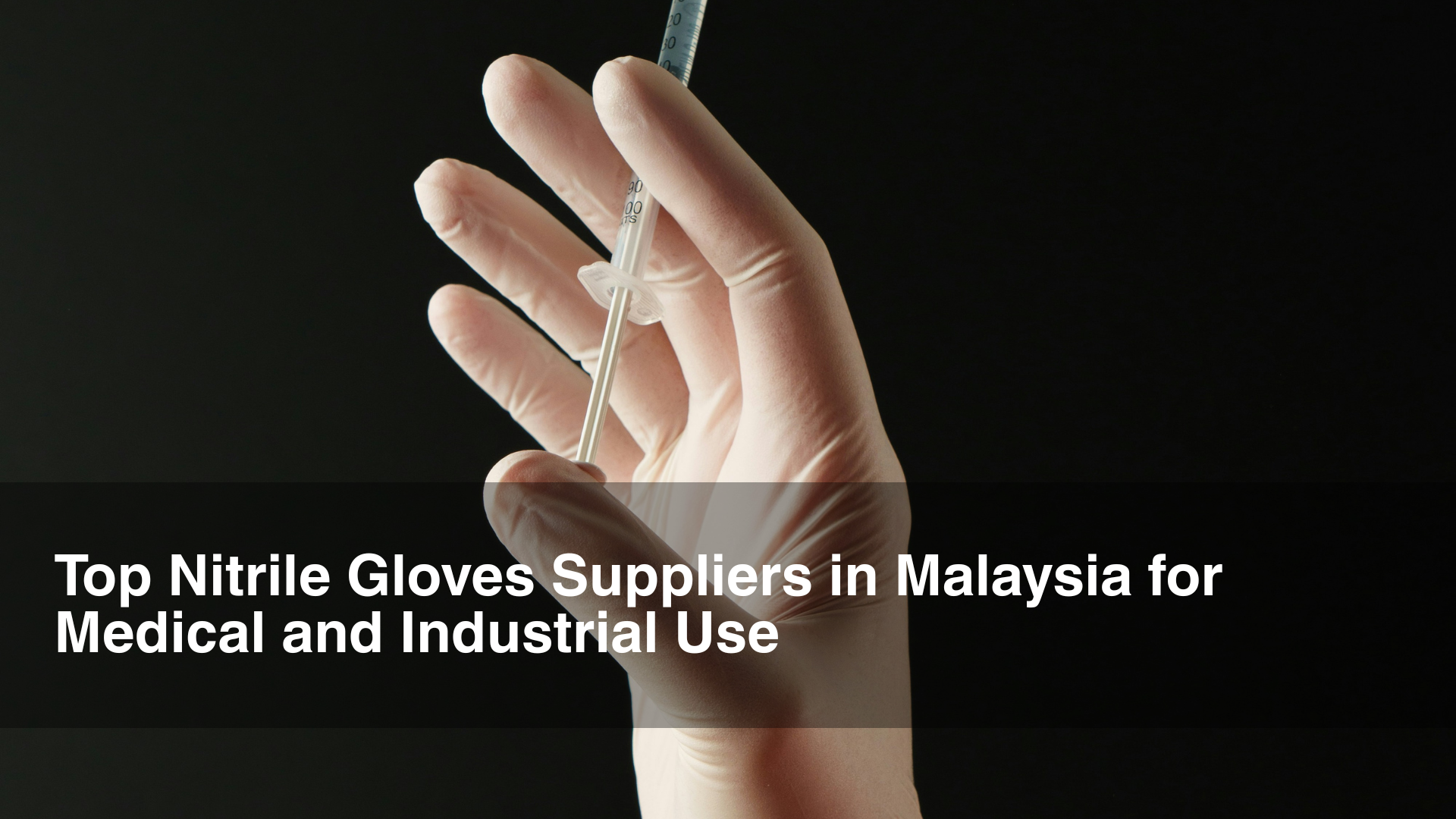 man in white nitrile glove holding a syringe
