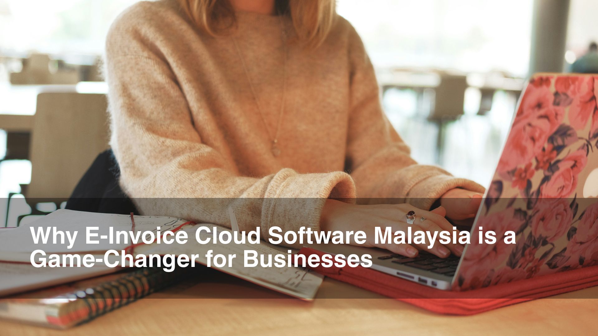 Woman types on her keyboard for einvoice