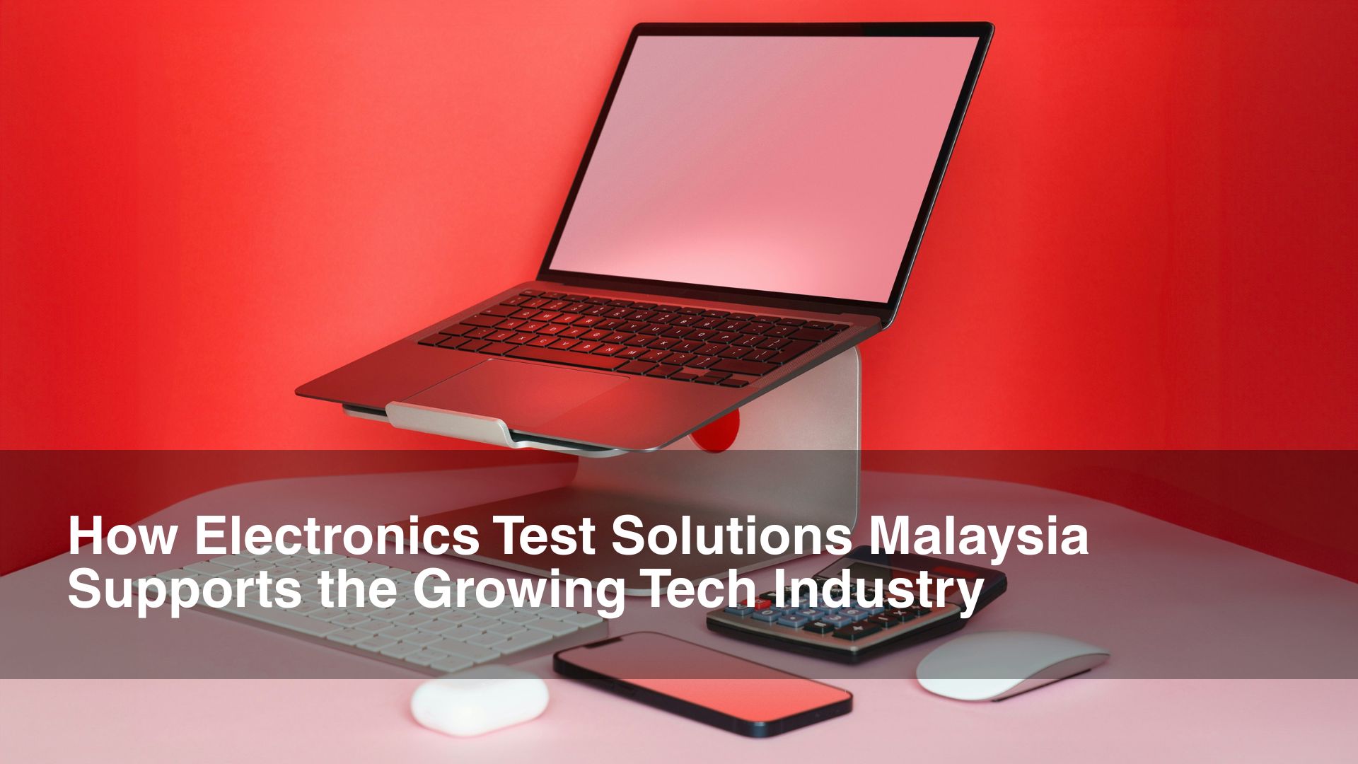 red laptop showing test solutions malaysia